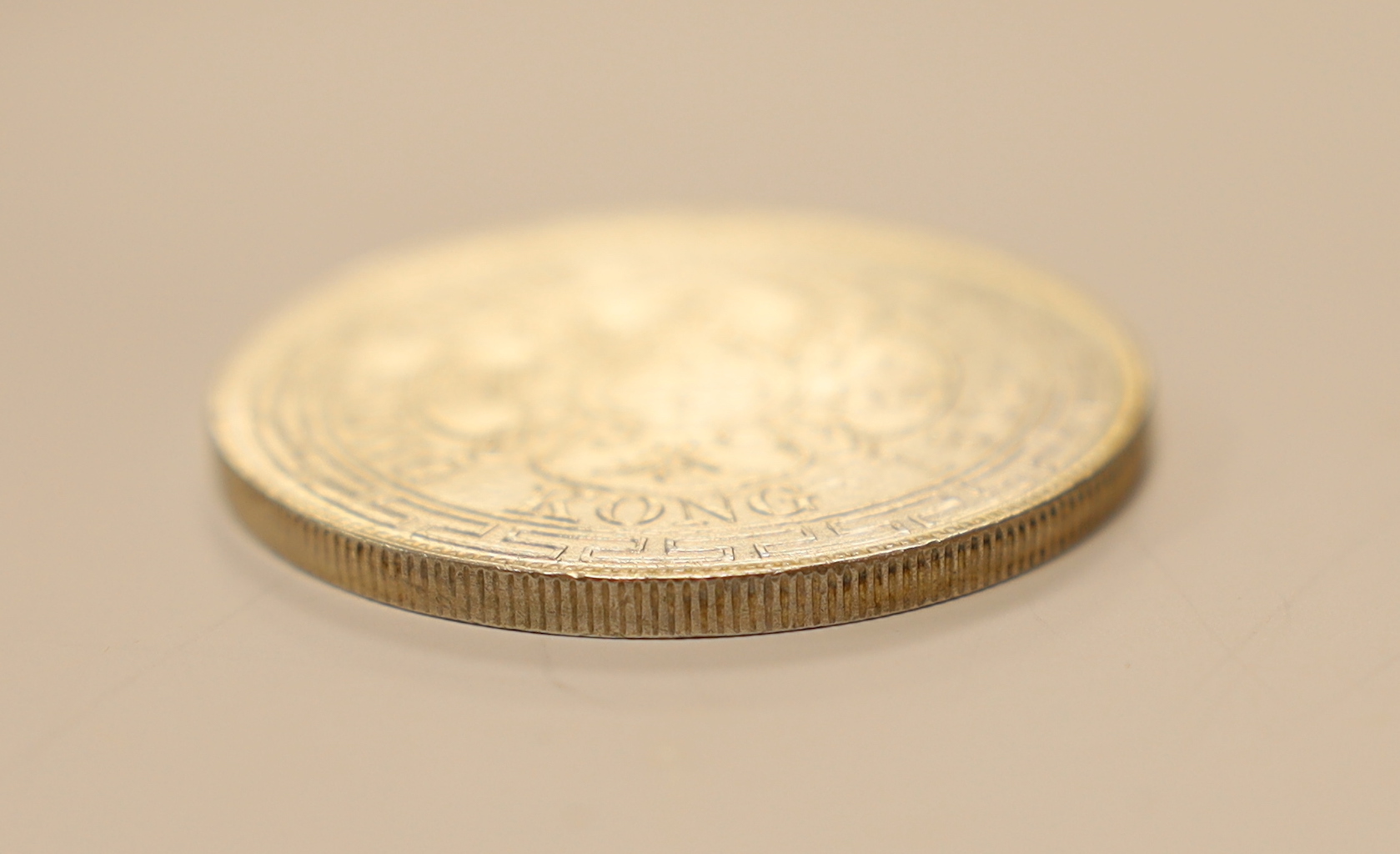 Hong Kong coins, Victoria silver dollar 1868, diademed head l., rev. value and date within ornate border (KM.10), cleaned otherwise near EF